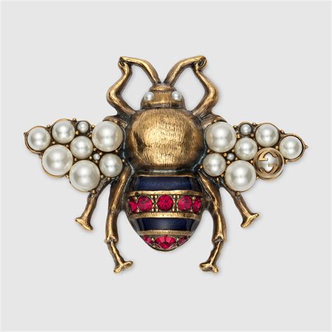 bee pin gucci jacket|gucci bee brooch.